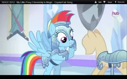 Size: 1280x800 | Tagged: armor, derpibooru import, hub logo, jousting, mannequin, rainbow dash, safe, san diego comic con, screencap, sdcc 2012, solo, spoiler:s03, the crystal empire, youtube
