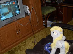 Size: 600x450 | Tagged: safe, artist:eratosofcyrene, derpibooru import, derpy hooves, pegasus, pony, female, gamecube, irl, mare, metroid, metroid prime, photo, plushie, samus aran, video game, wii