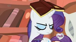 Size: 630x352 | Tagged: safe, derpibooru import, screencap, rarity, pony, unicorn, look before you sleep, book, ei, female, hub logo, mare, solo, youtube caption