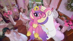 Size: 853x480 | Tagged: safe, derpibooru import, official, screencap, princess cadance, bird, human, pony, commercial, irl, photo, ponies in real life, vector, youtube link