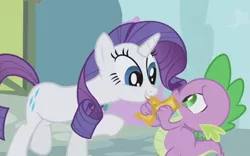 Size: 754x472 | Tagged: safe, derpibooru import, screencap, rarity, spike, dragon, pony, unicorn, the ticket master, eye contact, female, frown, gala ticket, golden ticket, grin, lidded eyes, looking at each other, male, mare, raised hoof, smiling, ticket, tongue out, worried