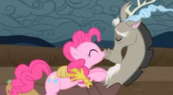 Size: 600x329 | Tagged: safe, derpibooru import, discord, pinkie pie, discopie, female, kissing, male, shipping, straight