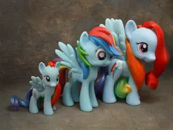 Size: 800x600 | Tagged: safe, derpibooru import, official, rainbow dash, pony, brushable, irl, photo, size comparison, toy