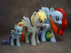 Size: 800x600 | Tagged: safe, derpibooru import, official, derpy hooves, rainbow dash, pony, brushable, irl, photo, size comparison, toy
