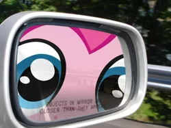 Size: 590x442 | Tagged: artist:necronomiconofgod, artist:ponyweed, automobile, car, close-up, close up series, derpibooru import, edit, extreme close up, fourth wall, fourth wall destruction, irl, mirror, objects in mirror are closer than they appear, parody, part of a set, photo, pinkie pie, rear view mirror, safe, the far side