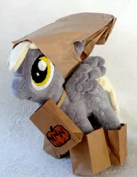 Size: 1691x2187 | Tagged: safe, artist:ismartman, derpibooru import, derpy hooves, pegasus, pony, female, irl, mare, paper bags, photo, plushie, solo