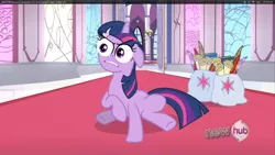 Size: 960x540 | Tagged: bag, derpibooru import, edit, edited screencap, floppy ears, hub logo, saddle bag, safe, screencap, sitting, solo, special eyes, spoiler:s03, the crystal empire, throne room, twilight sparkle