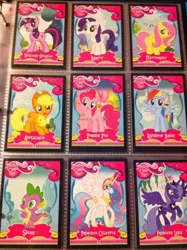 Size: 1936x2592 | Tagged: safe, derpibooru import, applejack, fluttershy, pinkie pie, princess celestia, princess luna, rainbow dash, rarity, spike, twilight sparkle, pony, card, irl, mane seven, merchandise, photo, trading card