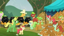 Size: 604x336 | Tagged: safe, derpibooru import, screencap, apple brown betty, apple cinnamon, apple dumpling, apple leaves, apple mint, bushel, candy apples, hoss, liberty belle, red gala, wensley, earth pony, pony, apple family reunion, apple family member, apple fritter (food), background pony, cauldron, cooking, female, filly, foal, food, male, mare, stallion