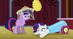 Size: 1341x731 | Tagged: safe, derpibooru import, screencap, rarity, twilight sparkle, pony, unicorn, spike at your service, barn, beehive, cannon, context is for the weak, female, gasp, mare, net, party cannon