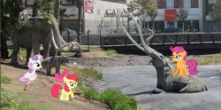 Size: 801x398 | Tagged: apple bloom, cutie mark crusaders, derpibooru import, irl, la brea tar pits, los angeles, mammoth, photo, ponies in real life, safe, scootaloo, sweetie belle, tar pit