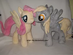 Size: 1632x1224 | Tagged: safe, artist:calusariac, derpibooru import, derpy hooves, fluttershy, pegasus, pony, derpyshy, female, irl, lesbian, mare, photo, plushie, shipping