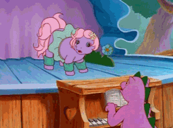 Size: 500x372 | Tagged: safe, derpibooru import, screencap, baby lickety split, spike (g1), dragon, earth pony, pony, my little pony: the movie (g1), animated, clothes, duo, female, filly, foal, g1, leg warmers, male, musical instrument, piano, stage, tutu