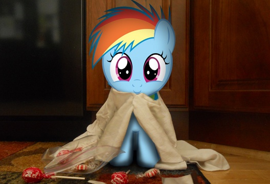 Size: 528x360 | Tagged: safe, artist:chubble-munch, artist:loneart8100, derpibooru import, rainbow dash, fanfic:my little dashie, candy, cute, dashabetes, filly, irl, looking at you, photo, ponies in real life