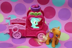 Size: 637x424 | Tagged: safe, derpibooru import, applejack, lyra heartstrings, applejack truck, brushable, hasbro, irl, photo, sitting, sitting lyra, toy