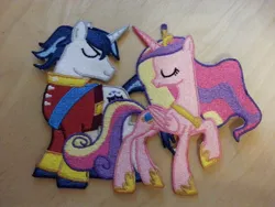 Size: 1306x980 | Tagged: artist:ethepony, derpibooru import, embroidery, patch, photo, princess cadance, safe, shining armor