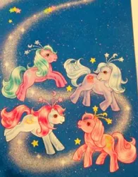 Size: 650x830 | Tagged: derpibooru import, fairy brights, fancy swirl ponies, g1, mistyglow, official art, pearlshine, promotional art, proof of existence, sad, safe, space, stars, starswirl, swirlabout