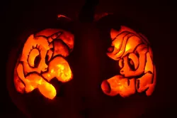 Size: 900x596 | Tagged: applejack, artist:serasmom, derpibooru import, halloween, holiday, jack-o-lantern, pumpkin, rarity, safe