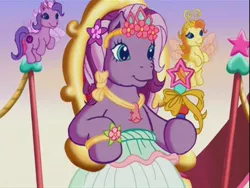 Size: 640x480 | Tagged: safe, derpibooru import, screencap, tiddlywink, wysteria, zipzee, breezie, earth pony, pony, the princess promenade, clothes, crown, dress, female, float, flower, g3, gown, holding, image, jewelry, jpeg, mare, necklace, parade, princess wysteria, regalia, ribbon, sitting, smiling, stars, throne, wand, youtube link