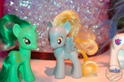 Size: 633x421 | Tagged: safe, derpibooru import, derpy hooves, lyra heartstrings, shining armor, pegasus, pony, unicorn, brushable, hasbro, milestone, toy