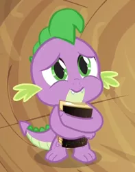 Size: 342x434 | Tagged: safe, derpibooru import, screencap, spike, dragon, magical mystery cure, baby, baby dragon, book, cute, fangs, green eyes, holding, male, sad, scales, solo, spikabetes, twilight's castle