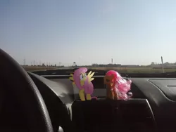 Size: 1600x1200 | Tagged: artist:missmayaleanne, brushable, car, derpibooru import, driving, fluttershy, frightened, irl, photo, ponies in real life, safe, toy