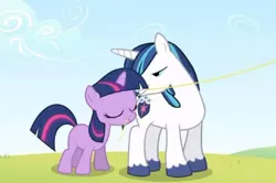 Size: 454x301 | Tagged: safe, derpibooru import, screencap, shining armor, twilight sparkle, a canterlot wedding, bedroom eyes, filly, kite, out of context, teenager