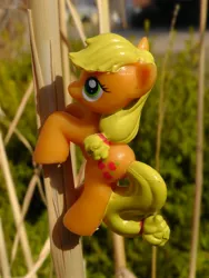 Size: 1944x2592 | Tagged: applejack, blind bag, derpibooru import, figure, irl, photo, plant, safe, solo, toy