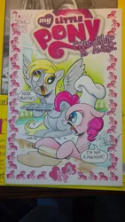 Size: 1024x1816 | Tagged: safe, artist:andypriceart, derpibooru import, idw, derpy hooves, pinkie pie, pegasus, pony, angry, baking, comic cover, dough, female, little tongue, mare