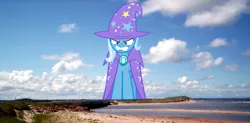 Size: 1000x493 | Tagged: safe, derpibooru import, trixie, pony, unicorn, angry, beach, canada, female, giant pony, giantess, highrise ponies, macro, mare, mega trixie, prince edward island, solo