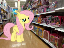 Size: 3264x2448 | Tagged: artist:serindo, derpibooru import, doll, fluttershy, ponies in real life, safe, shelf, solo, toy, toys r us, vector