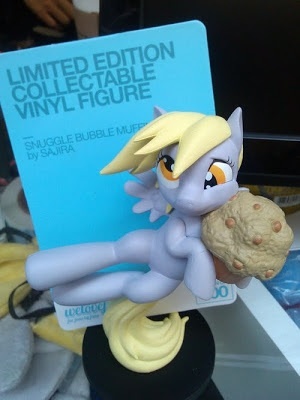 Size: 300x400 | Tagged: safe, artist:sambragg, derpibooru import, official, derpy hooves, pegasus, pony, comic con, female, figure, mare, muffin, san diego comic con, sculpture, snuggle bubble muffin, toy, welovefine