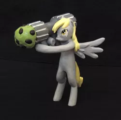 Size: 896x892 | Tagged: safe, derpibooru import, derpy hooves, pegasus, pony, cannon ponies, female, figurine, free standing, gileda, mare, muffin, muffin launcher, rocket launcher, sculpture, statue