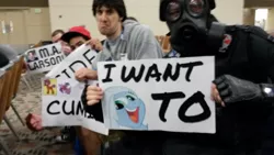 Size: 1280x720 | Tagged: bronycon, capper general, cappergeneral, derpibooru import, exploitable meme, human, irl, irl human, iwtcird, m.a. larson, /mlp/, oc, oc:tracy cage, photo, sign, smeel, suggestive