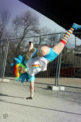 Size: 1067x1600 | Tagged: action pose, artist:stunt-sheep, clothes, cosplay, derpibooru import, human, irl, irl human, photo, rainbow dash, rainbow socks, safe, socks, solo, striped socks, thigh highs
