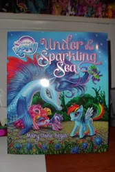 Size: 3072x4608 | Tagged: book, derpibooru import, fluttershy, merchandise, merpony, pinkie pie, rainbow dash, safe, spike, twilight sparkle, under the sparkling sea