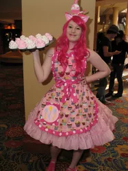 Size: 487x650 | Tagged: anime usa, apron, artist needed, artist:unkcos2, clothes, convention, cosplay, cupcake, derpibooru import, food, human, irl, irl human, photo, pinkie pie, platter, safe, solo