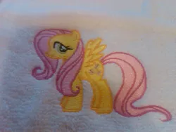 Size: 1024x768 | Tagged: safe, artist:ethepony, derpibooru import, fluttershy, pony, embroidery, wings