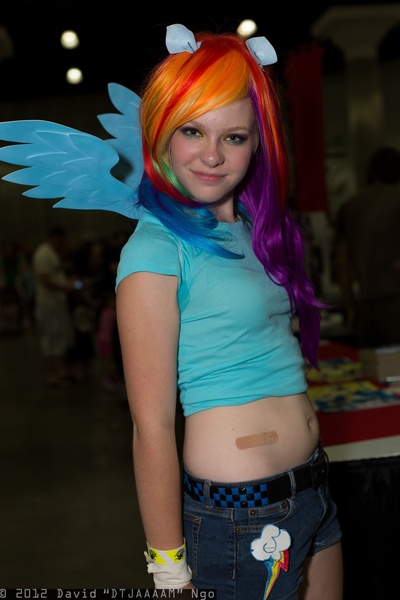 Size: 1365x2048 | Tagged: artist:flirty fillies, belly, belly button, comikaze expo, cosplay, derpibooru import, human, irl, irl human, photo, rainbow dash, safe, solo