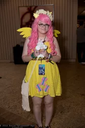 Size: 1365x2048 | Tagged: artist needed, safe, derpibooru import, fluttershy, human, cosplay, floral head wreath, glasses, irl, irl human, momocon, photo, plushie, solo