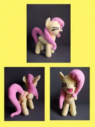 Size: 657x876 | Tagged: safe, derpibooru import, fluttershy, pegasus, pony, eyes closed, female, flutteryay, irl, mare, photo, plushie, yay