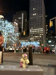 Size: 3264x2448 | Tagged: blind bag, city, derpibooru import, flag, fluttershy, irl, new york city, night, photo, rockefeller center, safe, sideways image, toy