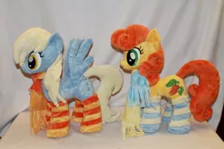 Size: 800x533 | Tagged: safe, artist:karasunezumi, derpibooru import, carrot top, derpy hooves, golden harvest, pegasus, pony, clothes, female, irl, mare, photo, plushie, scarf, socks, striped socks