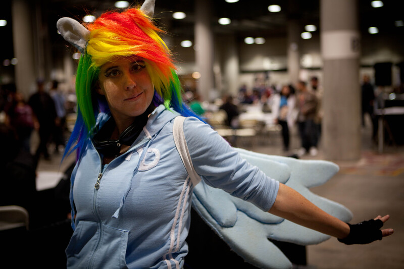 Size: 4743x3162 | Tagged: artist needed, safe, derpibooru import, rainbow dash, human, 2011, clothes, comikaze expo, convention, convetion, cosplay, derp, fingerless gloves, gloves, irl, irl human, photo