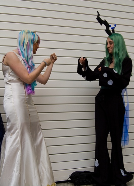 Size: 1149x1600 | Tagged: safe, derpibooru import, princess celestia, queen chrysalis, human, cosplay, irl, irl human, london mcm expo, london mcm oct 2012 expo, photo