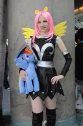 Size: 712x1072 | Tagged: anime expo, anime expo 2012, armor, armor skirt, artist:onlyfactory, bootleg, boots, clothes, cosplay, derpibooru import, fluttershy, human, irl, irl human, photo, plushie, private pansy, safe, shoes, skirt, solo
