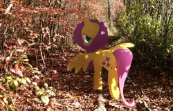 Size: 1024x655 | Tagged: artist:dawnfire, colored pupils, derpibooru import, fluttershy, forest, irl, looking at you, looking back, looking back at you, photo, ponies in real life, safe, wood