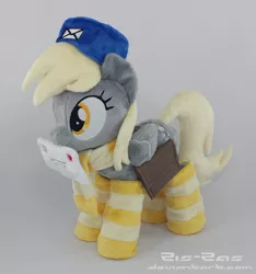 Size: 2012x2149 | Tagged: safe, artist:zizzaz, derpibooru import, derpy hooves, pegasus, pony, clothes, female, hat, irl, letter, mare, mouth hold, photo, plushie, scarf, socks, solo, striped socks