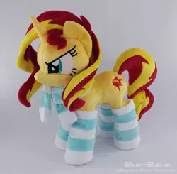 Size: 2510x2462 | Tagged: safe, artist:zizzaz, derpibooru import, sunset shimmer, pony, unicorn, clothes, irl, photo, plushie, scarf, socks, solo, striped socks