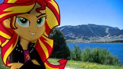 Size: 3840x2160 | Tagged: safe, artist:bastbrushie, derpibooru import, sunset shimmer, human, equestria girls, blue sky, clothes, crossed arms, cutie mark on clothes, equestria girls in real life, female, france, grin, irl, jacket, mountain, photo, ponies in real life, smiling, solo, town, tree, vector